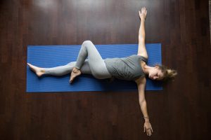 Supine spinal twist